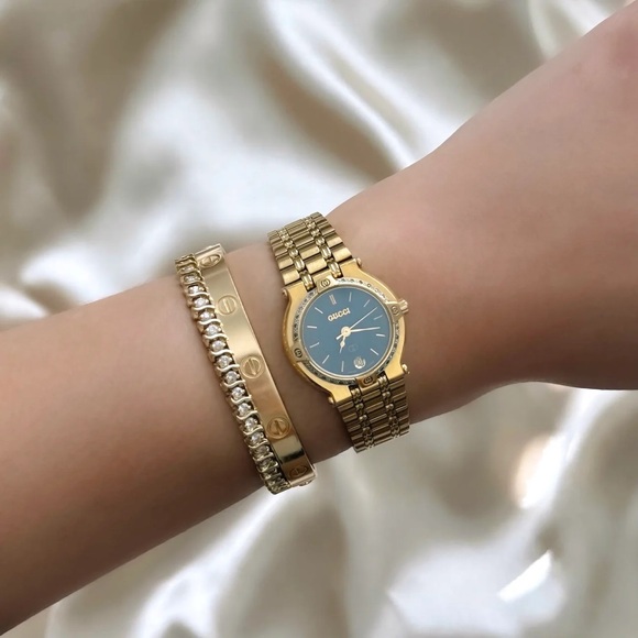 Gucci Accessories - AUTHENTIC VINTAGE GUCCI DIAMOND CUT BEZEL GOLD WATCH